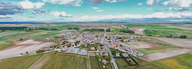 Aerial views of Melque de Cercos in the province of Segovia during a clear day with clouds