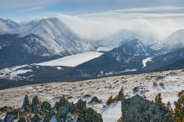 Snow-covered winter mountain lake, Russia, Siberia, Altai mountains.