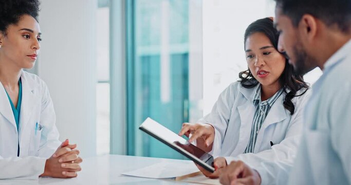Meeting, doctors and people on tablet in hospital for medical service, and online consulting. Healthcare, teamwork and men and women in discussion on digital tech for telehealth, website or research