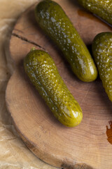 green cucumbers pickled in vinegar