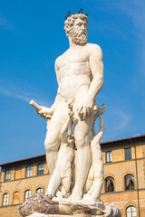 Fototapeta premium Florence, Italy - Neptune Fountain. Marble sculpture, Renaissance masterpiece, naked Poseidon
