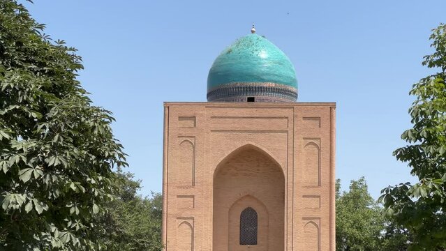 View of the Bibi Khanum Mausoleum. Samarkand, Uzbekistan - June 9, 2023. One of the most important monuments of Samarkand, a popular tourist destination in Central Asia. 4K