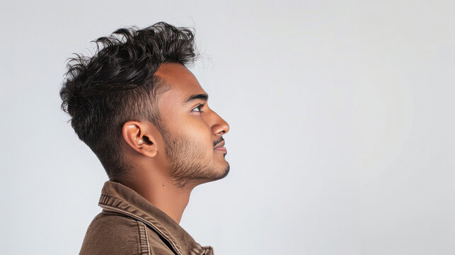 Side view of young and handsome indian man
