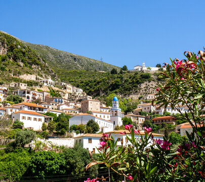 Sunny Village of Traditional Stone Houses and Pink Flowers - Dhermi, Albania