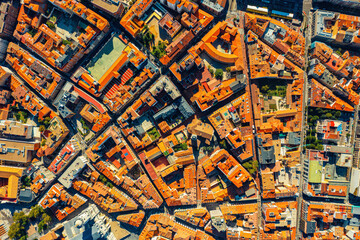Obraz premium Top view of the ancient houses of old town of Valladolid and Spain. Red roofs of the ancient city