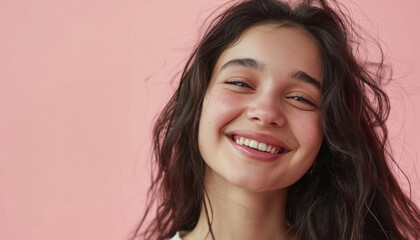 Young beautiful indian woman smiling on pink background