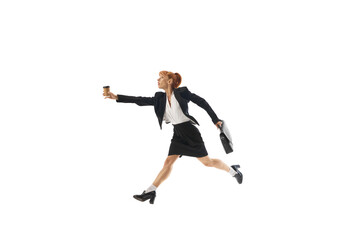 Being late at work. Woman, office worker in formal wear, with brief case running with coffee cup isolated on white background. Time management. Concept of business, office lifestyle