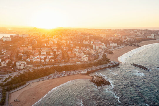 Sandy beach on the coast of Spanish city of Santander at sunset