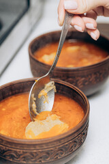 Red Ukrainian borscht on the table. Cooking the national first course