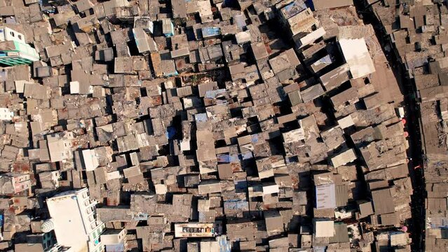 Aerial View of Dharavi Slum in Mumbai India. Poor Housing and Lack of Hygiene in Famous Neighborhood. Dharavi is considered to be one of the largest slums in the world and the largest in Asia.
