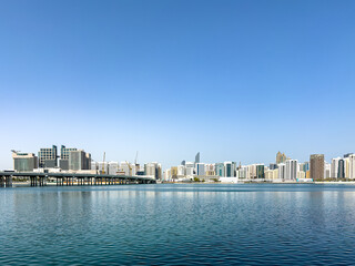 Fototapeta premium Abu Dhabi, UAE skyline as seen from Al Maryah Island, formerly known as Sowwah Island, a natural island located northeast of Abu Dhabi city center