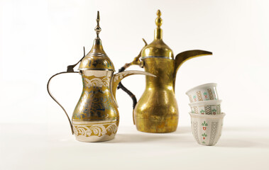 Antique traditional Arab dallah with cups, ready for Eid