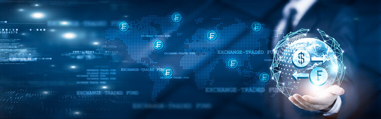 Businessman holding global network connection on ETF exchange-traded fund and market trend analytics, investment strategy and portfolio management, risk assessment, technology, global diversification.
