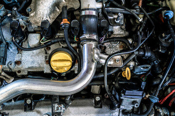 Fototapeta premium Car engine. Gasoline engine and car engine structure during technical inspection