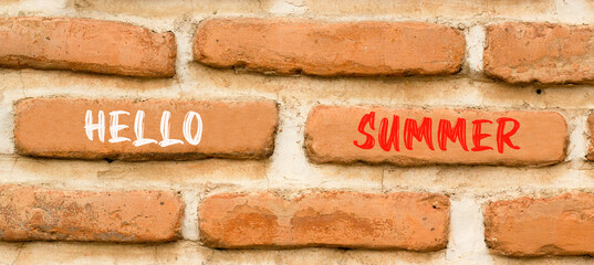 Fototapeta premium Hello summer symbol. Concept words Hello summer on beautiful brick wall. Beautiful red brown brick wall background. Business lifestyle Hello summer concept. Copy space.