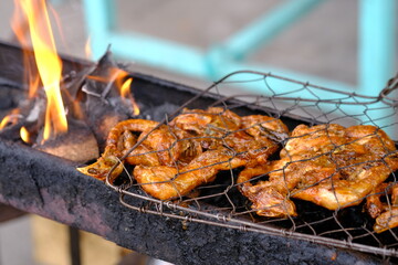 ayam bakar Taliwang is Taliwang grilled chicken is a typical food of Lombok and Sumbawa, West Nusa Tenggara. Spicy shrimp paste chicken. Indonesian food. 