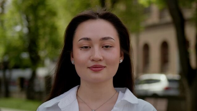 Close-up portrait of nice-looking asian beautiful businessperson elegant young woman looking into camera. Career people.Female portraits.