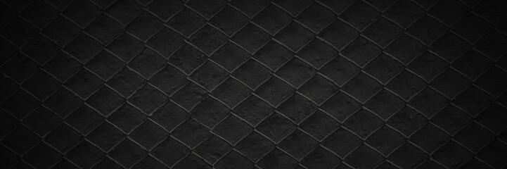 Metal mesh texture. Pattern of metal grid on a gray background. Dark wide panoramic background for...