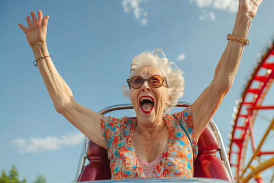 Senior woman experiencing the thrill of a roller coaster, defying age stereotypes with zest for life