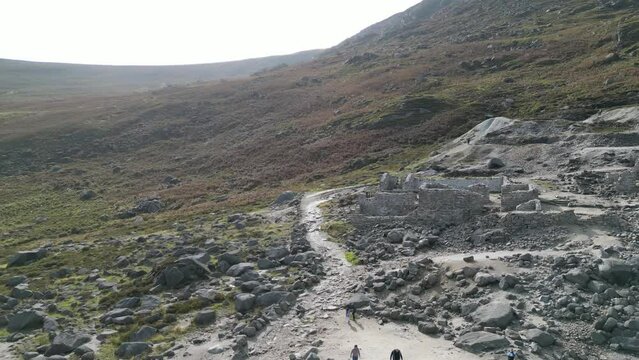 Drone shot above the abandoned 150 year old miners' village at the top of the Wicklow Gap, Ireland.