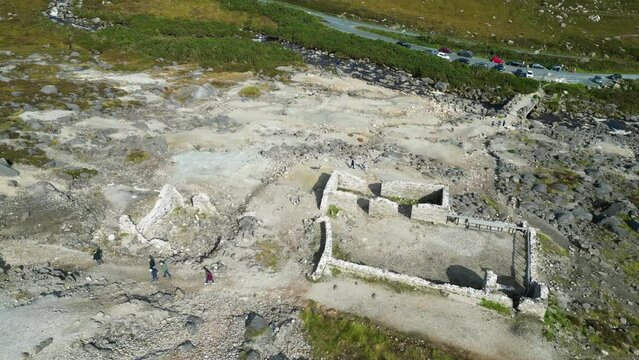 Drone shot above the abandoned 150 year old miners' village at the top of the Wicklow Gap, Ireland.