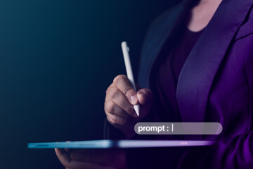 Using an electronic pen, a businessman writes commands on a tablet's virtual screen, demonstrating...
