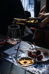 Intimate Wine Pouring Moment at a Cozy Gathering