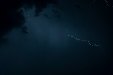 Beautiful Lightning Strikes and Clouds at Night in Lugano, Ticino, Switzerland.