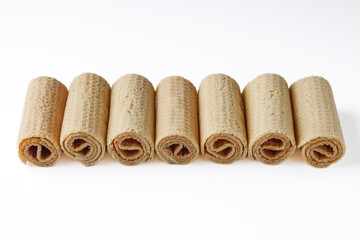 crispy dessert wafer rolls on a white background