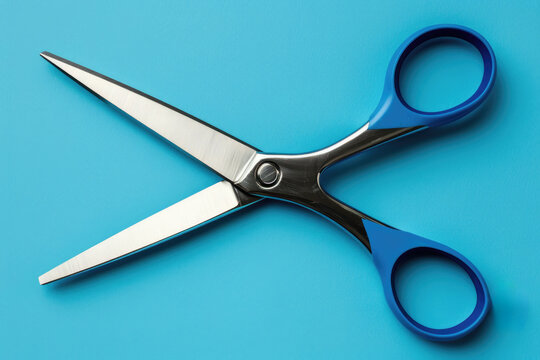 A pair of blue scissors is open against a blue background. - Powered by Adobe
