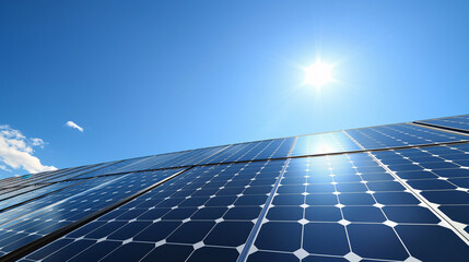 An array of rooftop solar panels glistening in the sunlight against a clear blue sky, showcase the efficiency and sustainability of renewable energy technology.