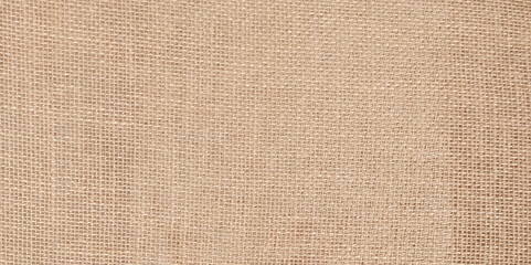Fototapeta na wymiar Brown light linen texture or background for your design. Beige textile linen tablecloth in full frame. Cloth texture background. Copy space. Banner. High quality photo