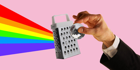 Playful image featuring disco ball placed on grater, creating colorful rainbow flow on pink...