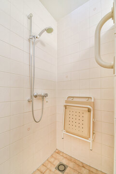 Accessible Shower Stall with Safety Features and Foldable Seat