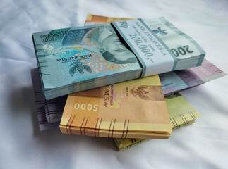 Selective focus. New rupiah money. Indonesia currency isolated white background.
