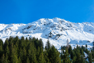 Snowy Sasso Ombria mountain - Lukmanier mountain region in Switzerland