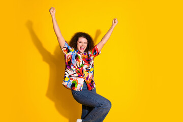 Photo portrait of attractive young woman winning celebrate dressed stylish colorful print clothes...