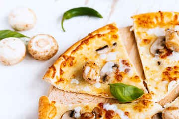 Tasty fresh baked pizza with champignons and chicken fillet