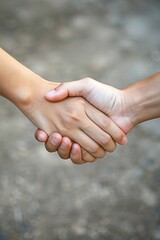 Handshake is a symbol of happy friendship on Friendship Day.