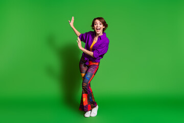 Photo portrait of funny young woman in purple stylish shirt trendy vintage pants and brown bob...