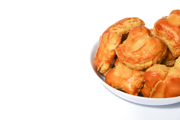 peanut almond cookies topped with sliced peanuts.