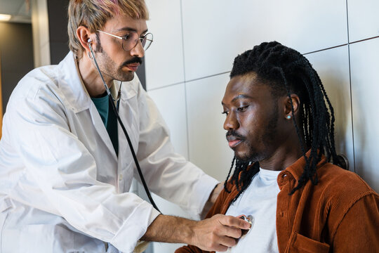 Doctor checking patient for signs of hypoglycemia