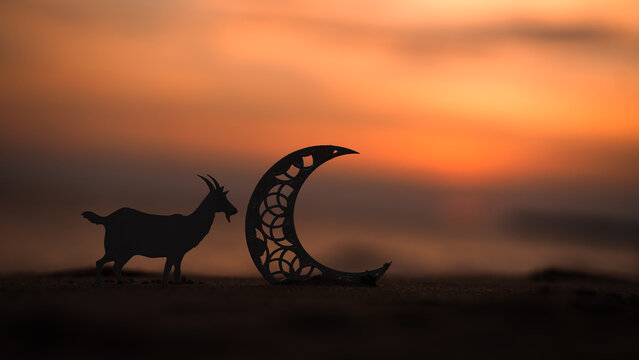 Eid al Adha background, goat with crescent moon on the nature background, Ramadan greeting poster 2025
