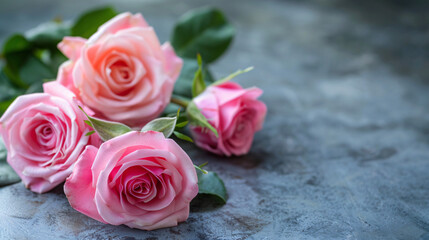 Pink roses. Beautiful pink roses arranged on a dark gray surface with green leaves. AI generative.