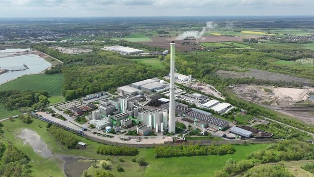 Aerial birds eye drone view on the Asdonkshof waste disposal center in Kamp Lintfort. Germany. It consists of two independent incineration lines with downstream scrubbing and a turbine plant to