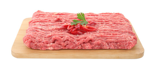 Board with raw ground meat, chili pepper and parsley isolated on white