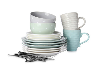 Set of beautiful ceramic dishware and cutlery isolated on white