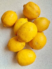 fresh lemons, citrus fruits, fruits stacked on top of each other, sour fruits, yellow fruits