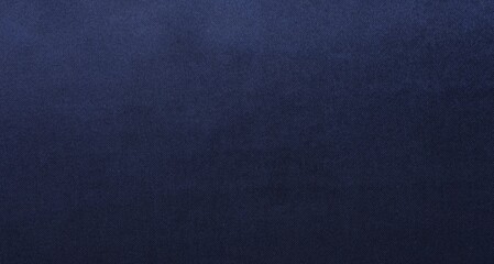 Texture of dark blue silk fabric as background, top view