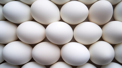 white eggs piled up on each other top view